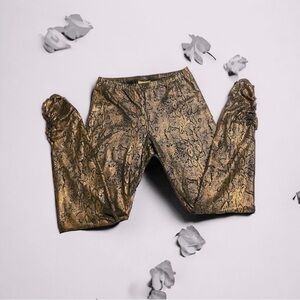 Miss Tina Leggings By Tina
Knowles Size M(8-10)
Gold Black Snake Print